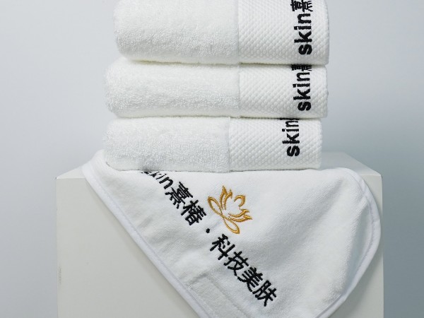 Pure cotton white towel with platinum segment embroidery in the beauty salon