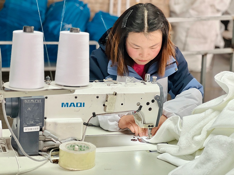 Footage of work in a sewing factory