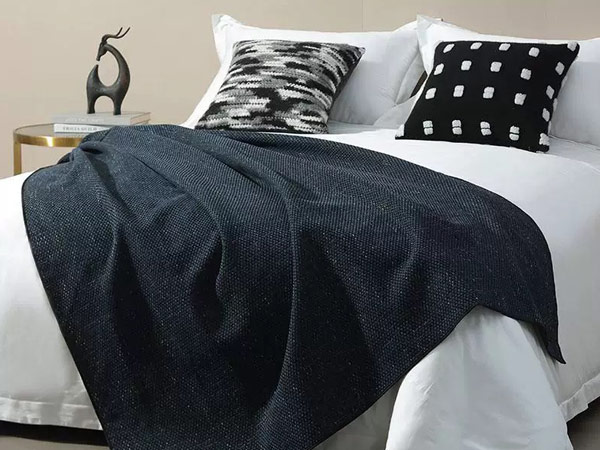 Hotel bed end towel