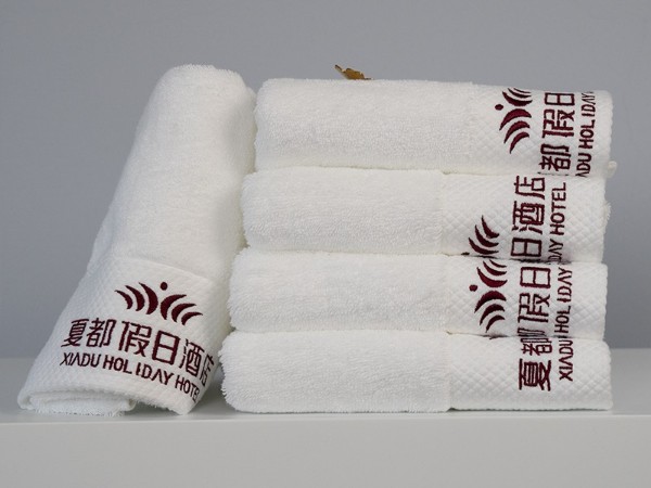 White and platinum embroidered Holiday Inn 100% cotton towel